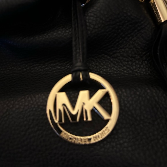 Michael Kors Black Leather Drawstring or Bucket Bag with gold hardware. - Picture 16 of 16